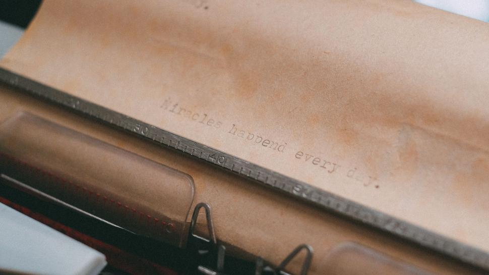Free Image of Brown Paper Bag on Typewriter 