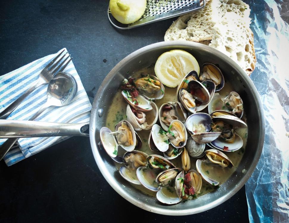 Free Image of Clams Filled Pan on Table 
