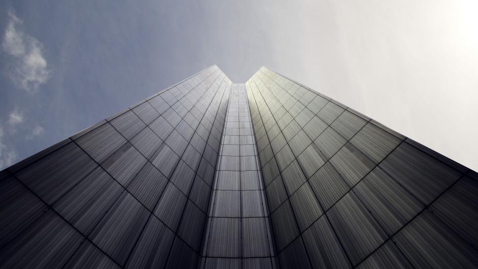 Free Image of Looking up at the Top of a Tall Building 