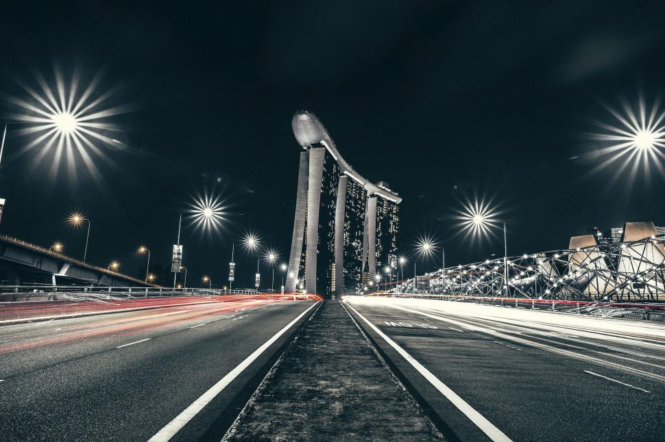 Free Image of Empty Highway at Night With Street Lights 