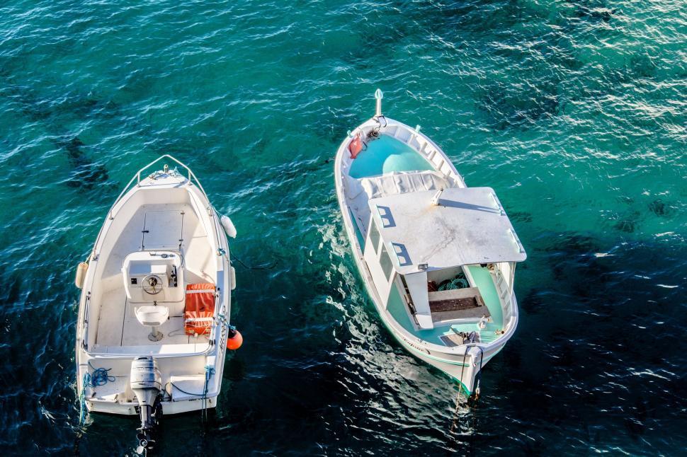 Free Image of Two Boats Near Each Other in the Water 