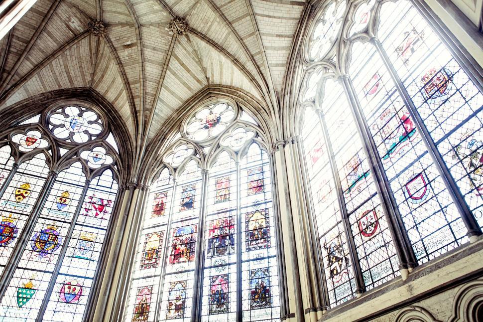 Free Image of Grand Cathedral With Multiple Stained Glass Windows 