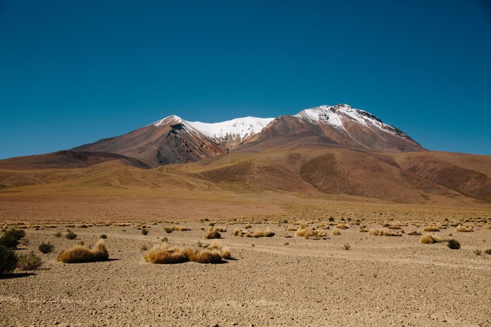 Free Image of Majestic Mountain Range Rising in Desert Landscape 