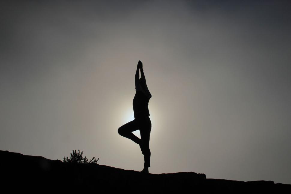 Free Image of Person Performing Yoga Pose on Hilltop 