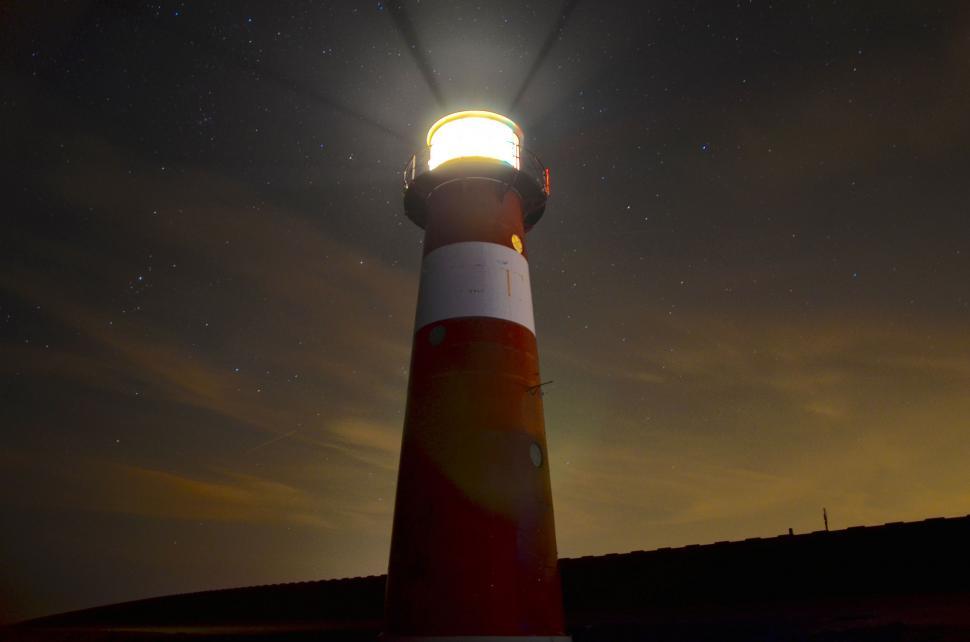 Free Image of Lighthouse Illuminated by Beacon Light 