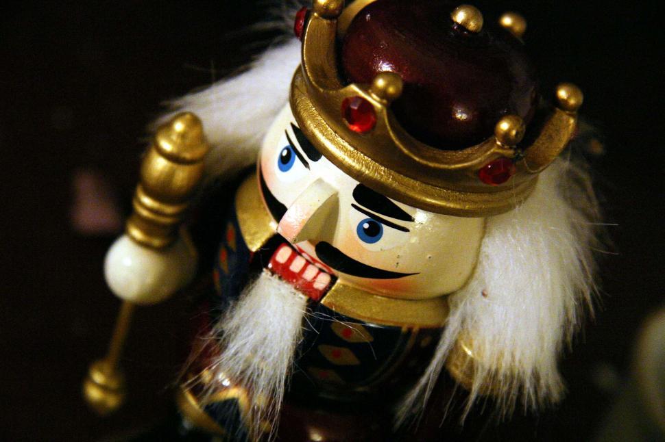 Free Image of Nutcracker Wearing Crown and Holding Cane 