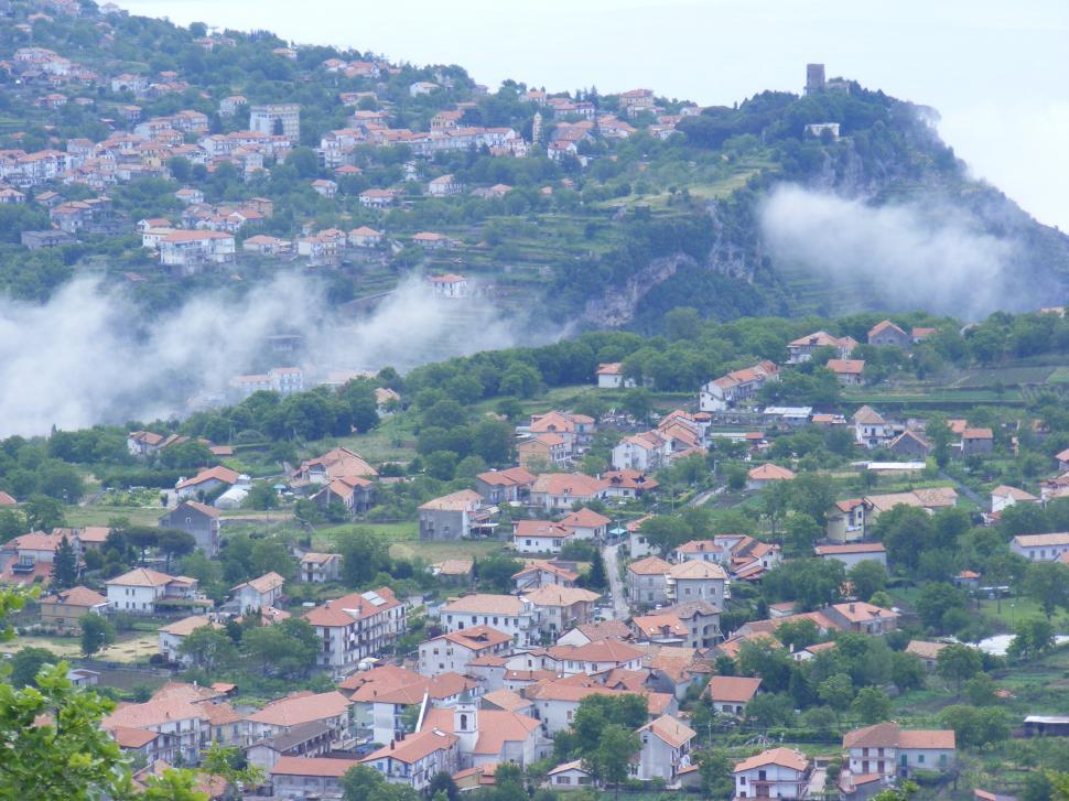 Free Image of Small rural mountain town under the clouds  