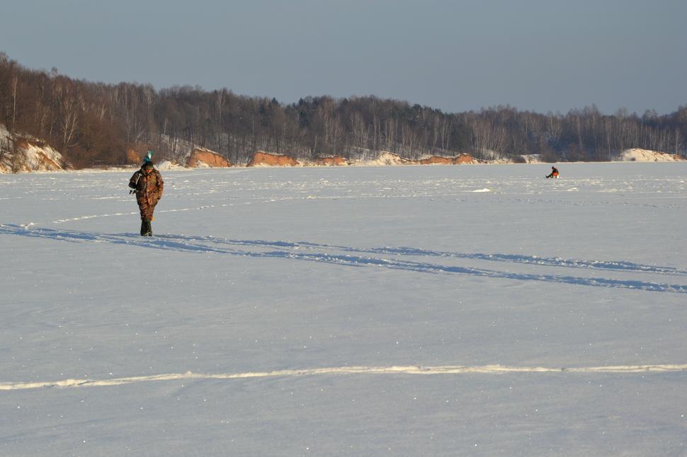 Free Image of Angler on the frozen lake  