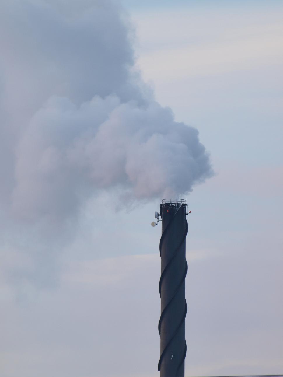 Free Image of Big Chimney Spews Smoke 