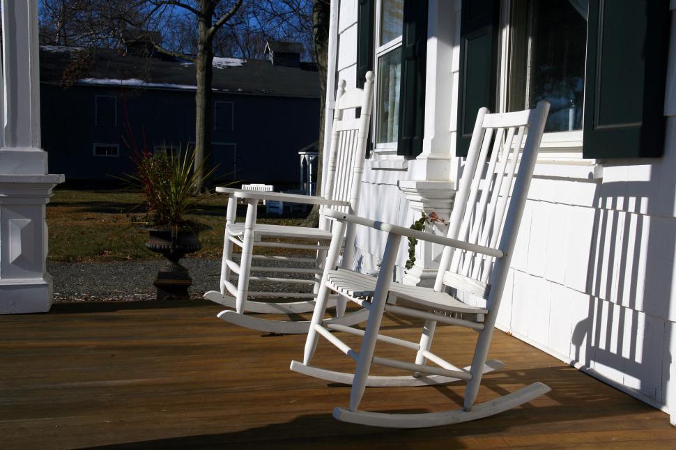 Free Image of Rocking Chairs on a Porch 