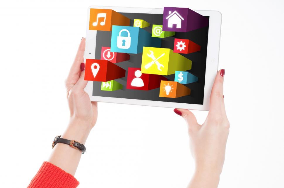Free Image of Woman Holding Tablet with App Icons 