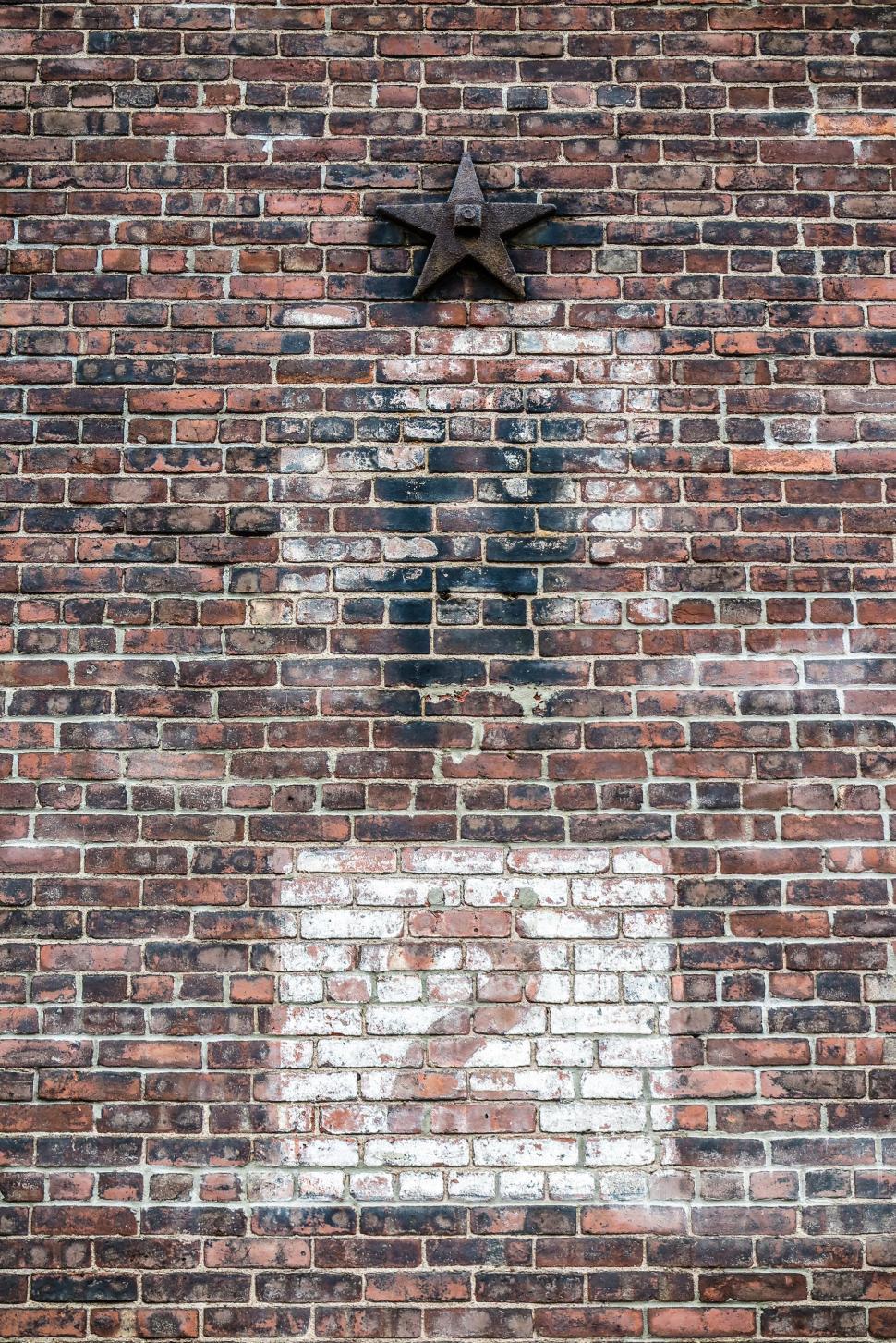 Free Image of Brick wall with iron star 