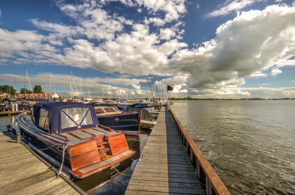 Free Image of Row of Boats on Pier 
