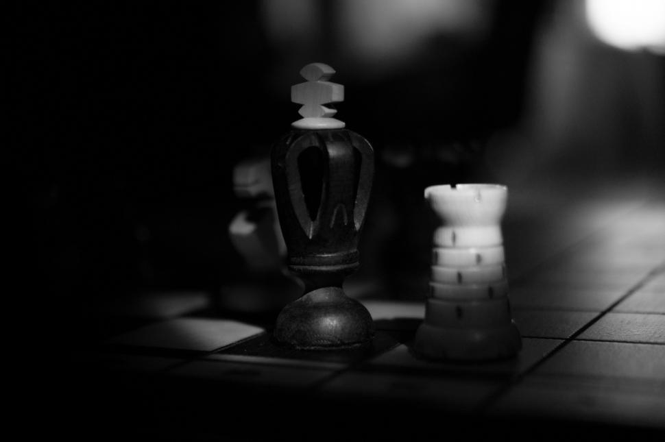 Free Image of Strategic Battle: Black and White Chess Pieces 