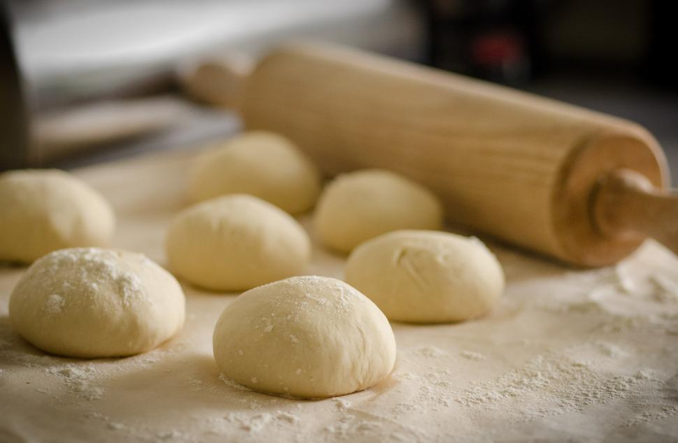 Free Image of Array of Dough Balls on Table 