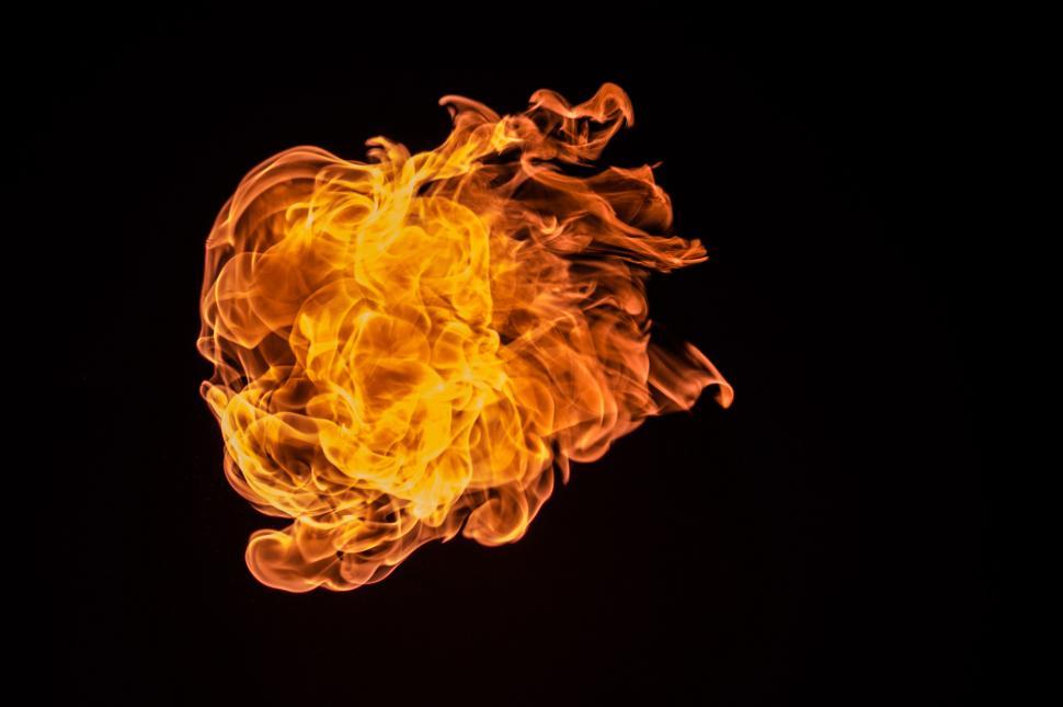 Free Image of Intense Ball of Fire Against Black Background 