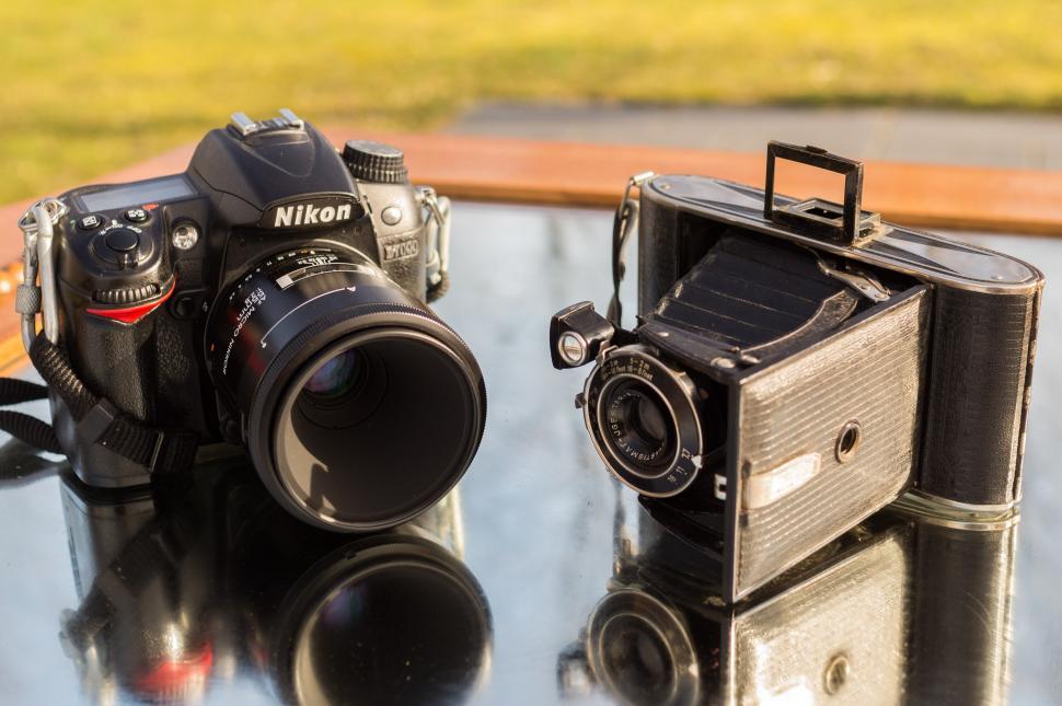 Free Image of Two Cameras on Table 