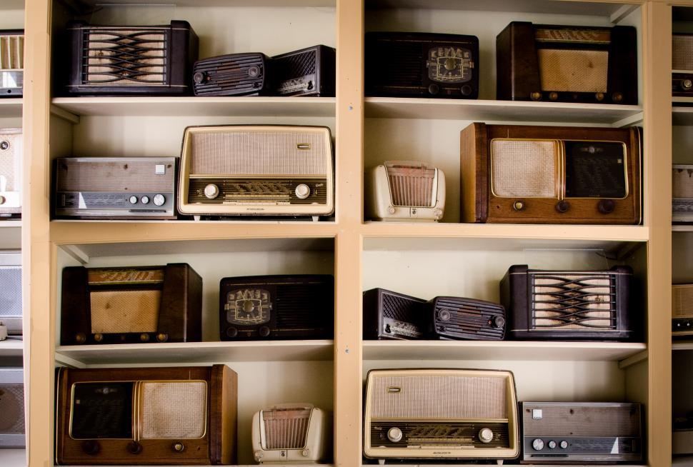 Free Image of Shelf Filled With Old Fashioned Radio Sets 
