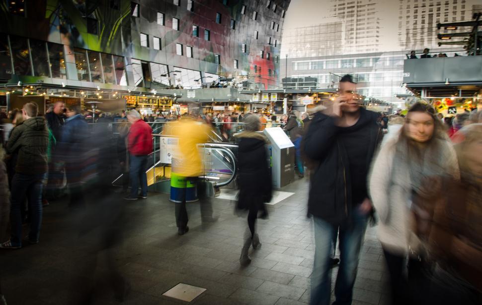 Free Image of Blurry Photo of People Walking in a Busy City 