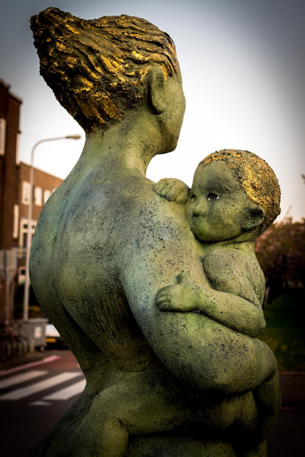 Free Image of Statue of a Woman Holding a Baby 