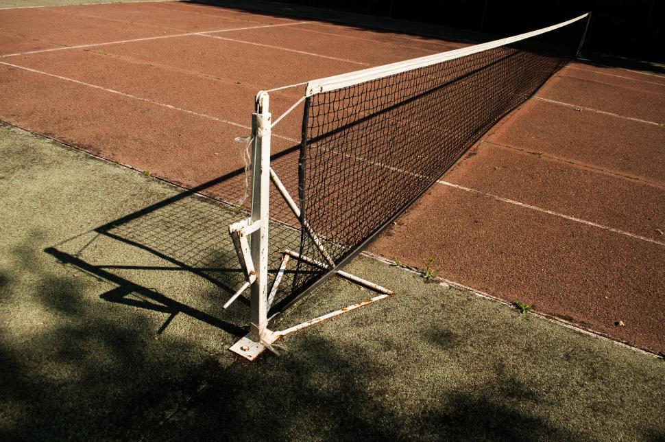 Free Image of Tennis Court With Net on Ground 