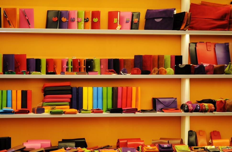 Free Image of Colorful Bags Filling a Shelf 
