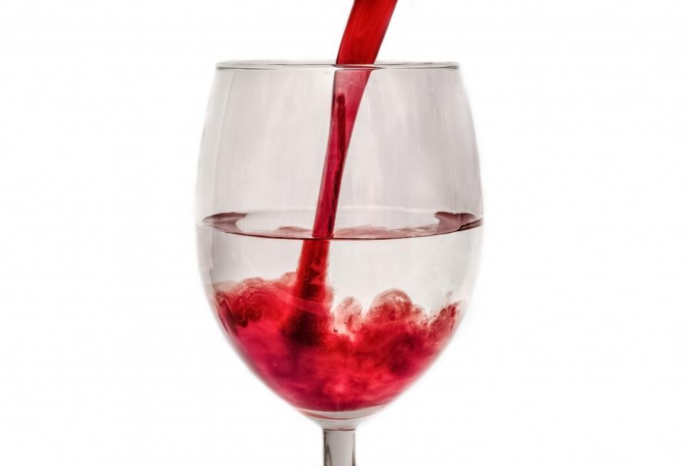 Free Image of Wine Glass Filled With Red Liquid 