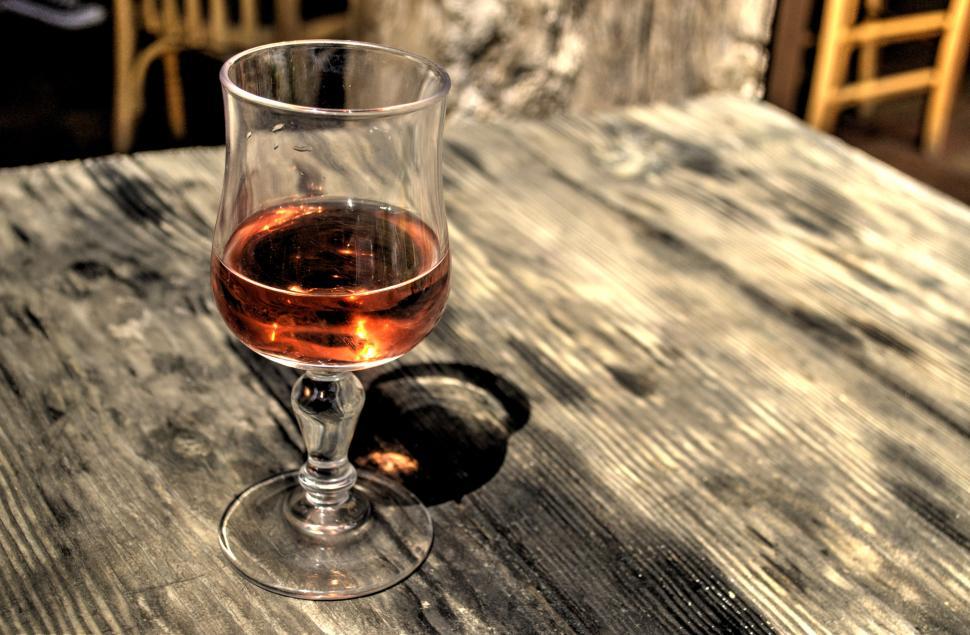Free Image of Glass of Wine on Wooden Table 
