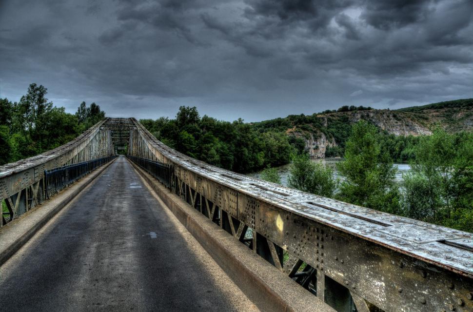 Free Image of Long Bridge Under Cloudy Sky 