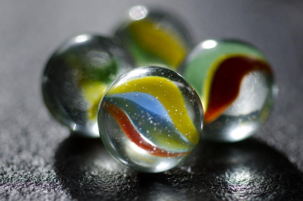 Free Image of Group of Marbles on Table 