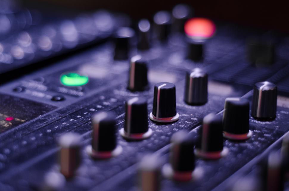 Free Image of Close Up of a Sound Board With Buttons 