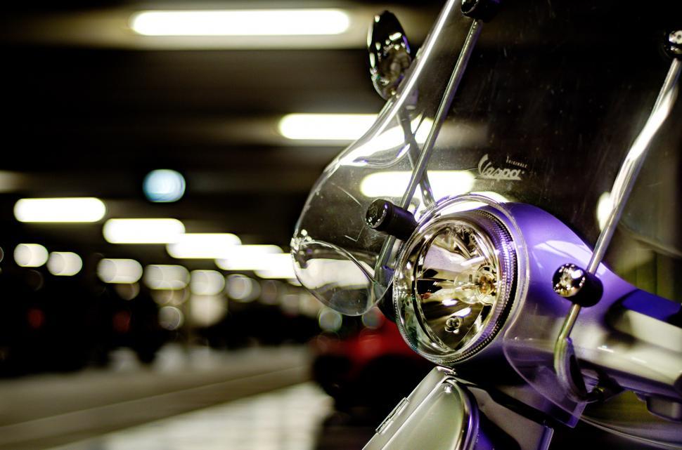 Free Image of Purple Motorcycle Parked in Parking Garage 