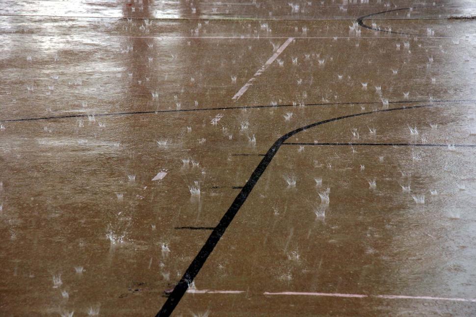 Download Free Stock Photo of Rain out at the basketball court 