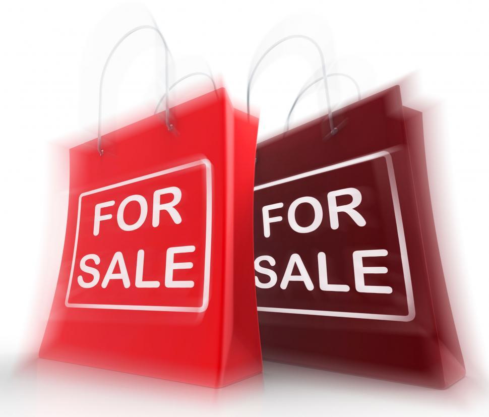 Free Image of For Sale Shopping Bags Represent Retail Selling and Offers 