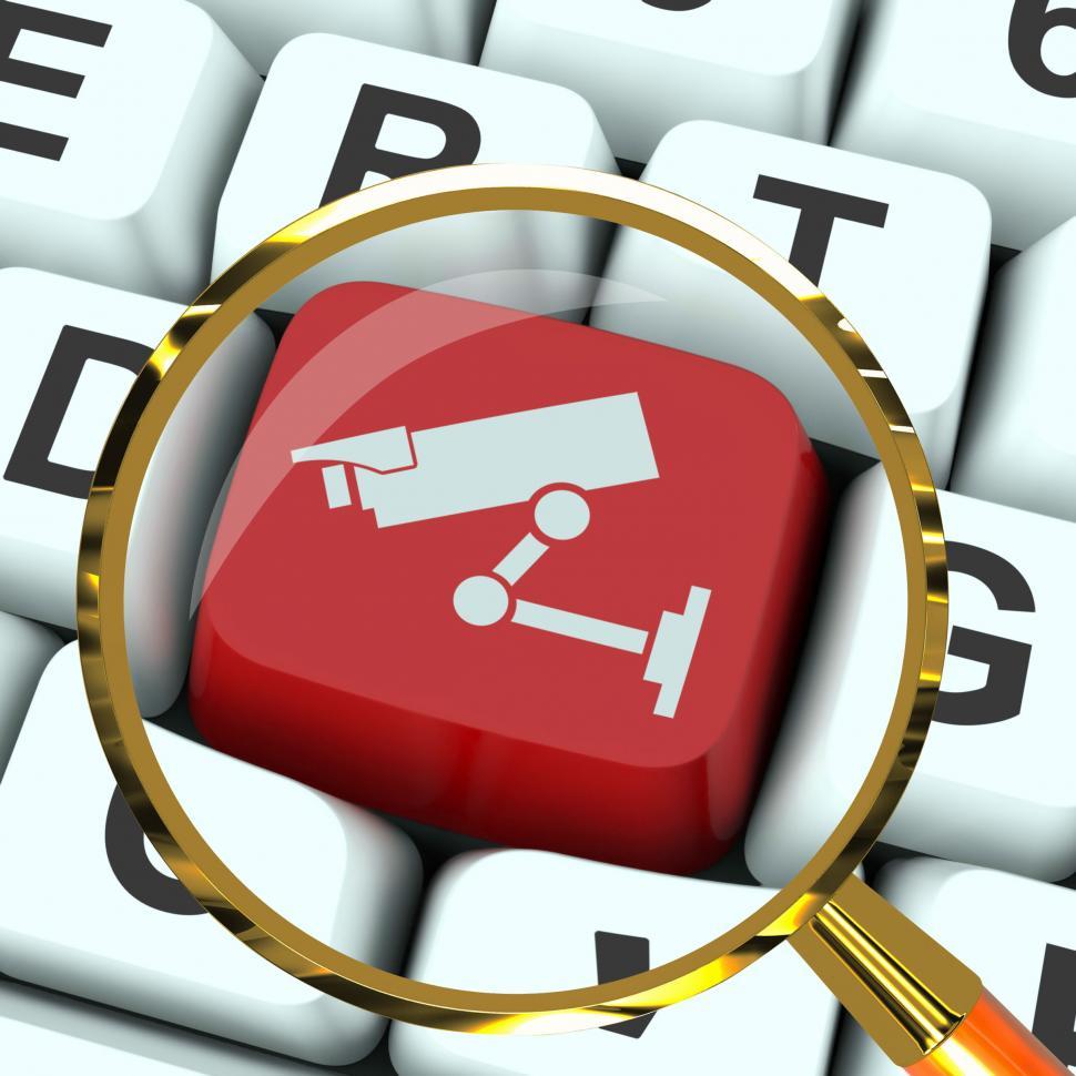 Free Image of Camera Key Magnified Shows CCTV and Web Security 
