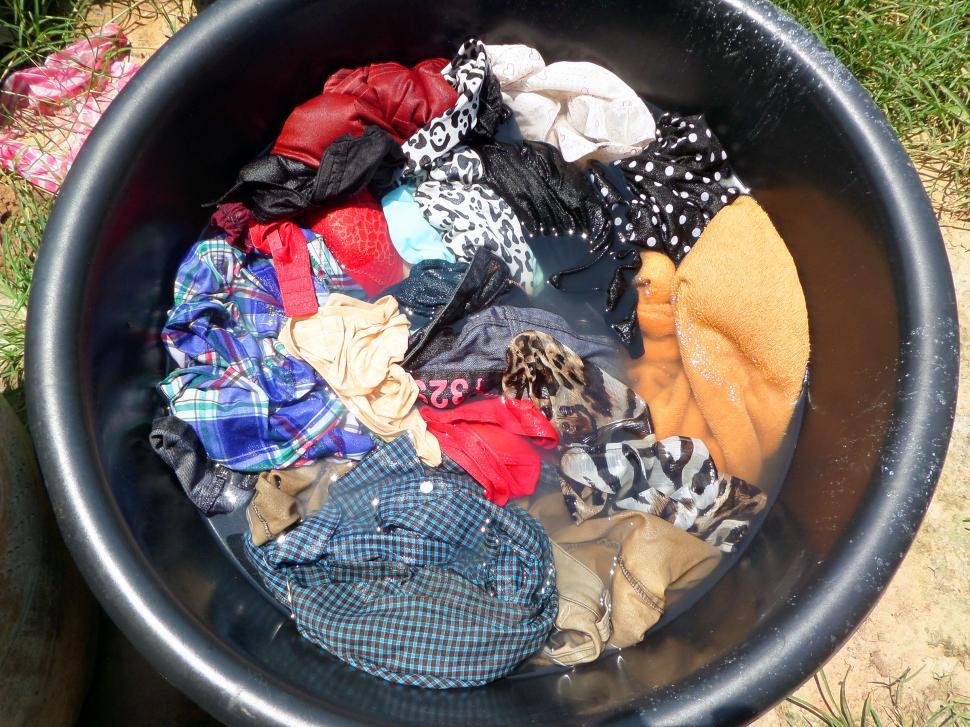 Free Image of Clothes soaking in a basin 