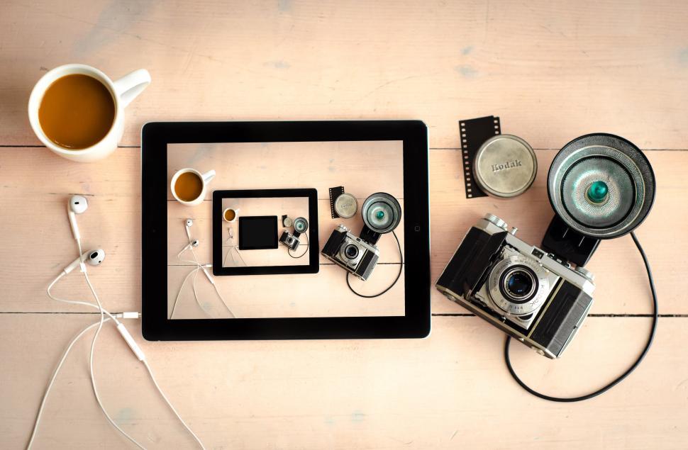 Free Image of Table With Camera and Coffee Cup 