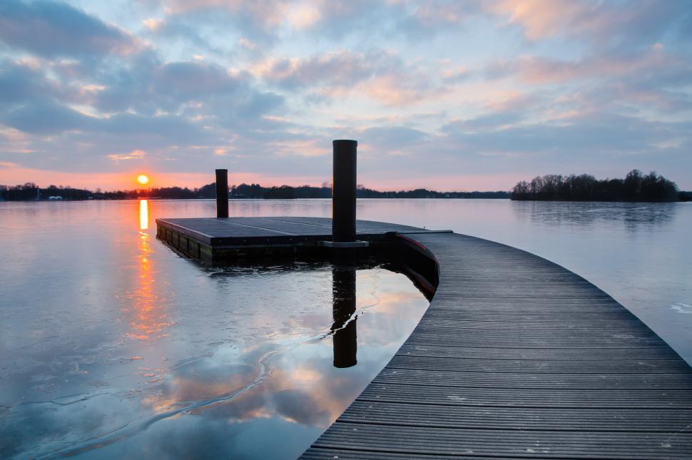 Free Image of Dock on Water With Sunset 
