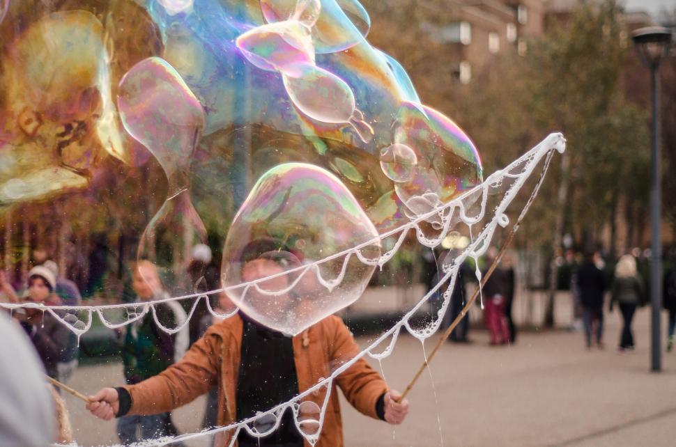 Free Image of Young Boy Playing With Soap Bubbles 
