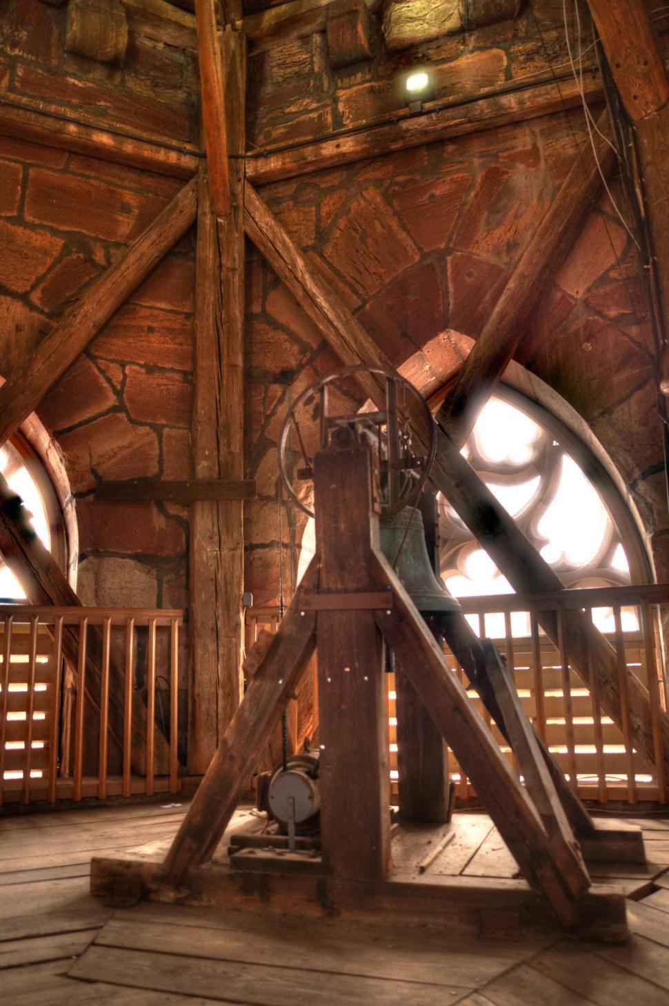 Free Image of Large Wooden Structure With Clock on Top 
