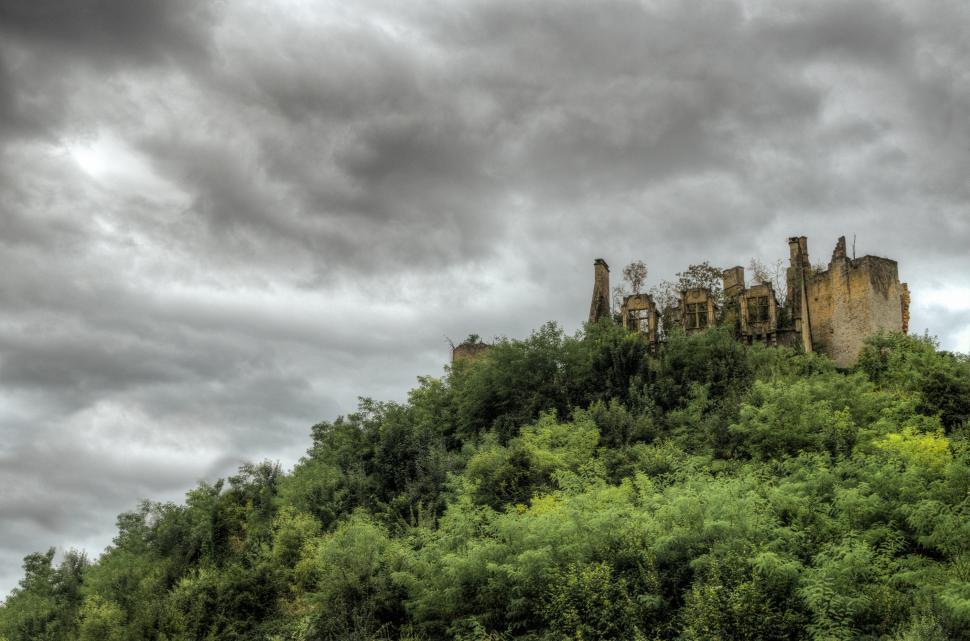 Free Image of Castle on Lush Green Hillside 