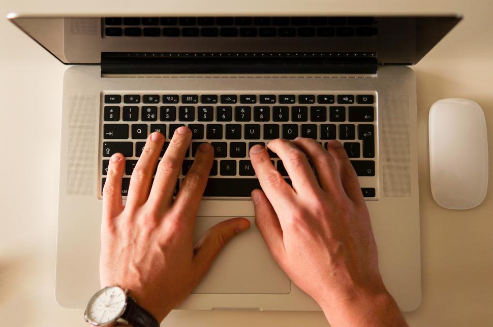 Free Image of Person Typing on Laptop With Hands 