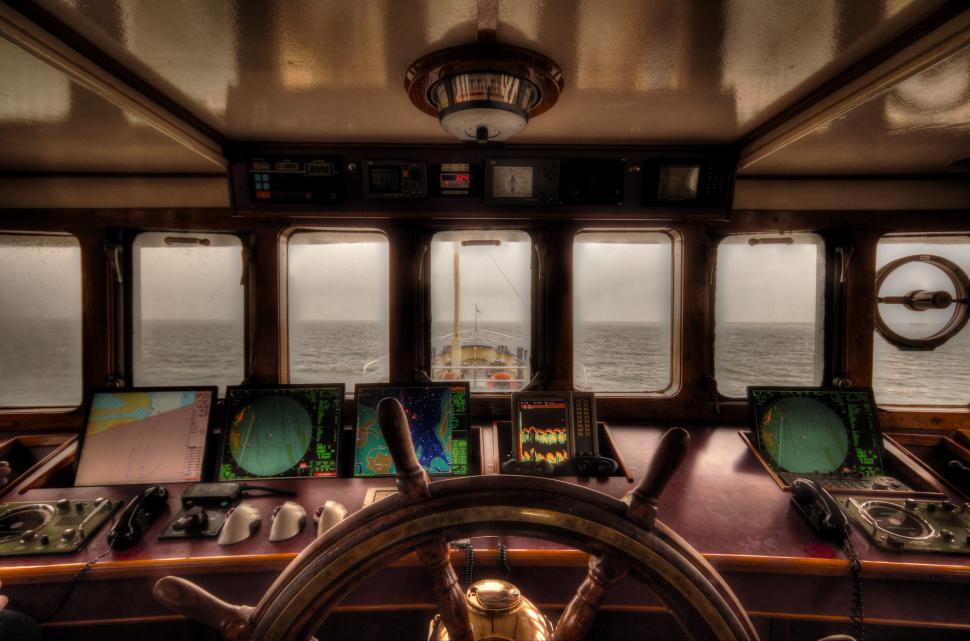 Free Image of Steering Wheel on Boat in Ocean 
