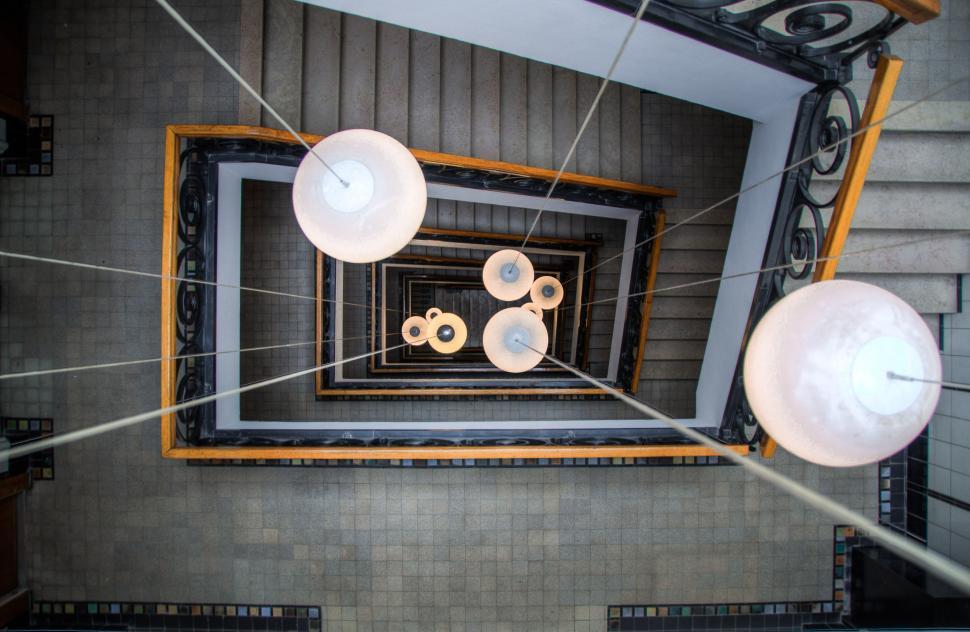 Free Image of Overhead View of Stairwell With Lights 