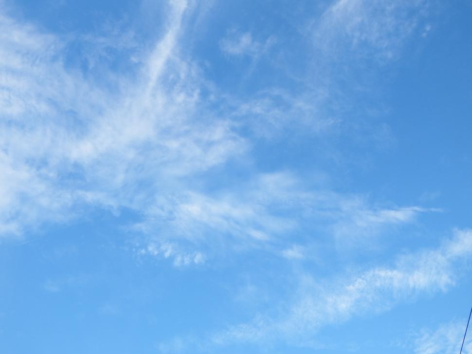 Free Image of Blue Sky and Fluffy White Clouds  