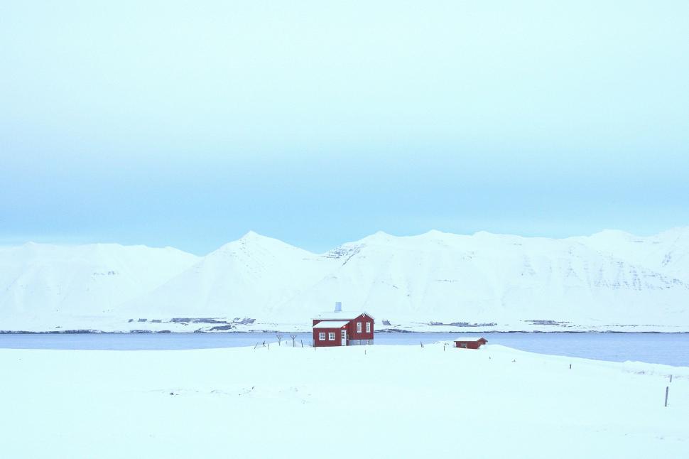 Free Image of Red House in Snowy Field 