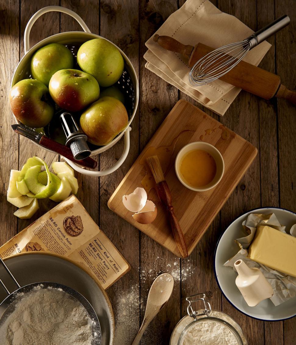 Free Image of Wooden Table Topped With Apples and Cheese 