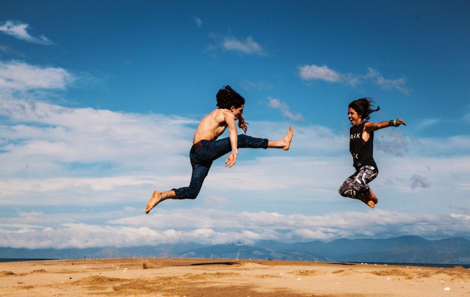 Free Image of Jumping Couple in the Air 