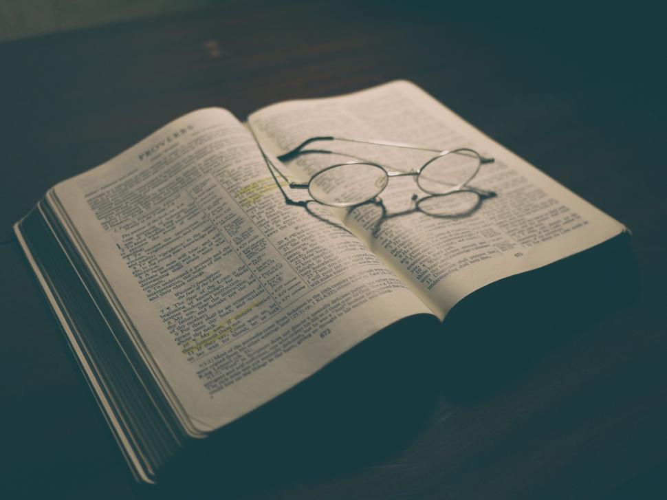 Free Image of Open Book With Drawn Glasses 