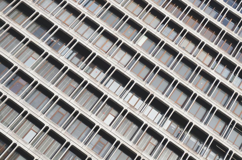 Free Image of Close Up of Building Facade With Numerous Windows 